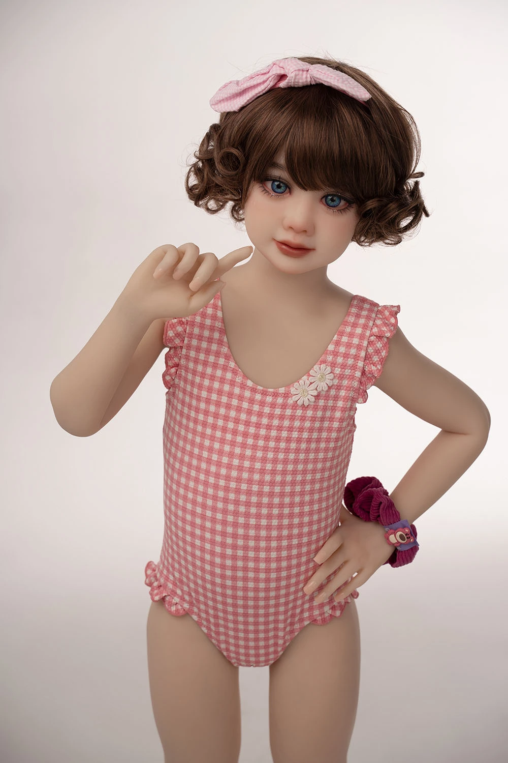  axb doll with pink headband